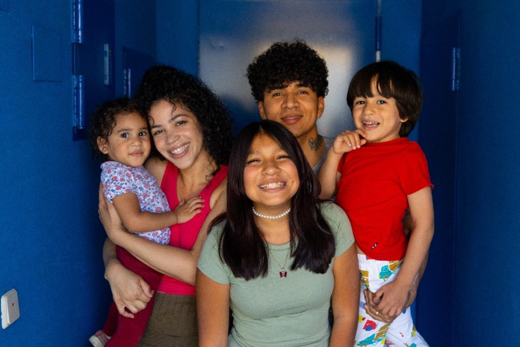 Happy Family Enjoying Quality Time Together In Colorful Setting